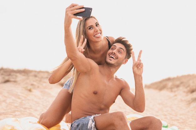 Front view of couple taking photo