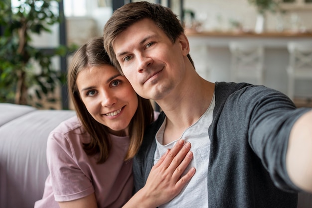 Front view of couple taking a selfie