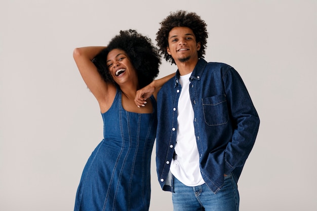 Free photo front view couple with afro hairstyles