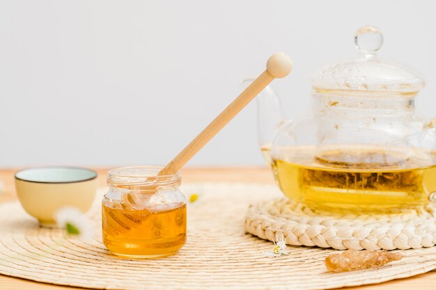 Front view crystal teapot and honey jar