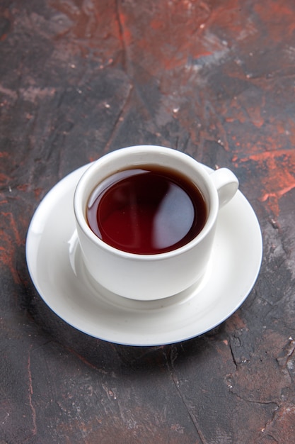 Free photo front view cup of tea on dark table color dark ceremony tea