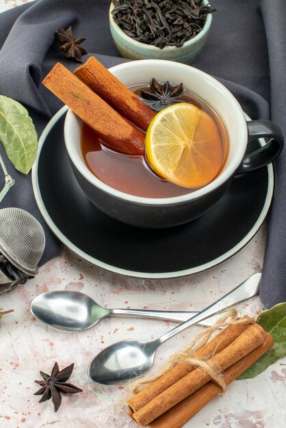 Front view cup of tea with lemon on white background breakfast ceremony flavor food color morning fruit flowers