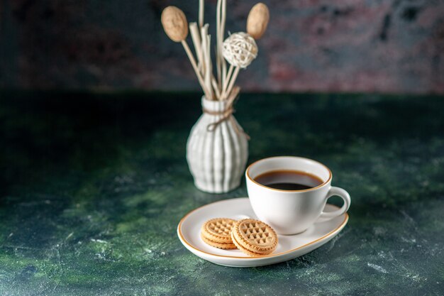 front view cup of tea with little sweet biscuits in white plate on dark surface color ceremony breakfast morning photo bread glass drink