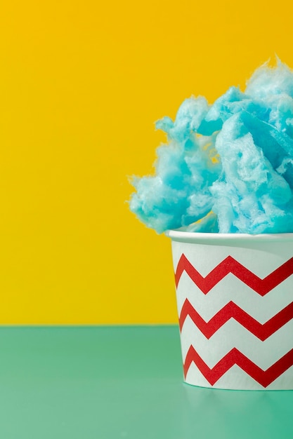 Free photo front view of cup with cotton candy