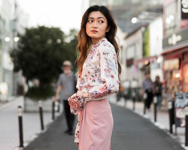 Front view of cute japanese girl in tokyo