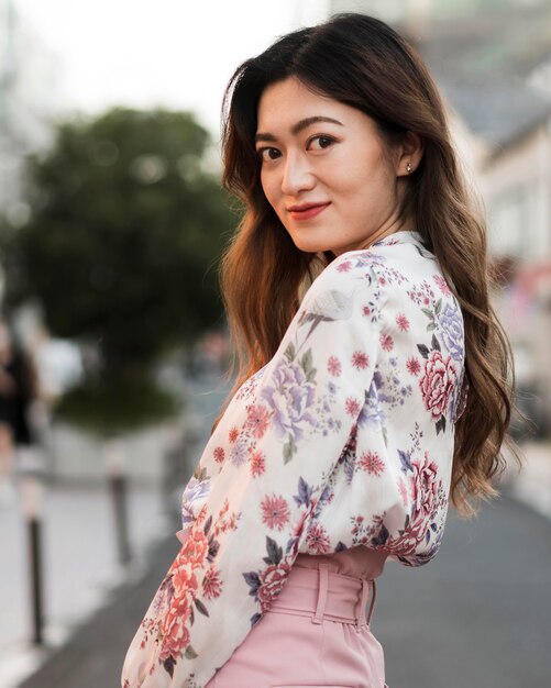 Front view of cute japanese girl in tokyo