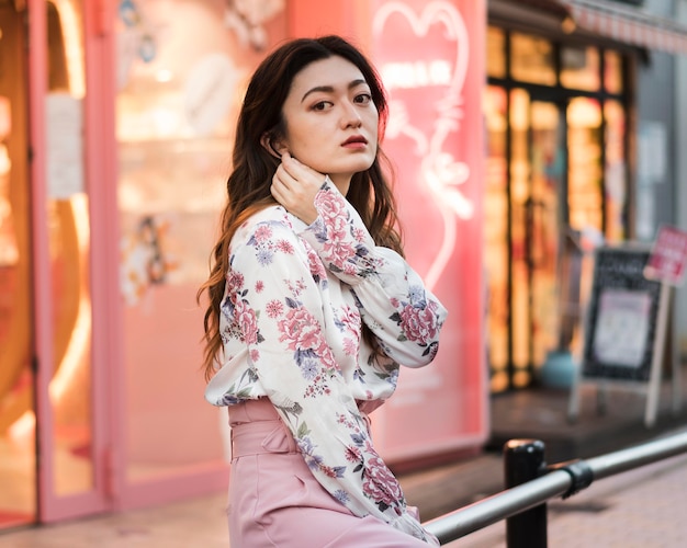 Front view of cute japanese girl in tokyo