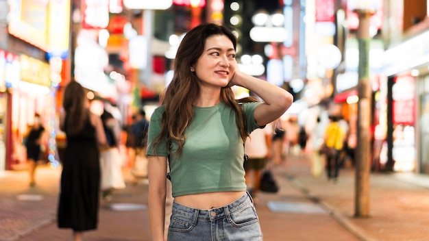 Free photo front view of cute japanese girl in tokyo