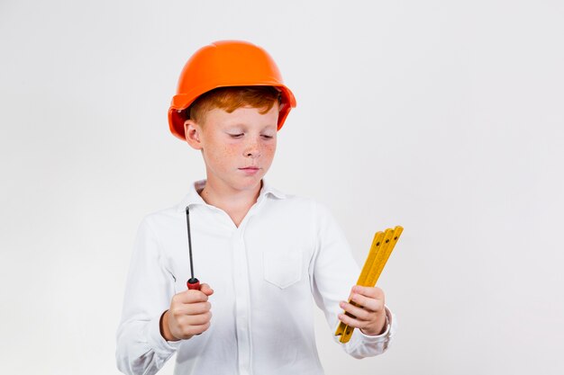 Front view cute kid with safety helmet