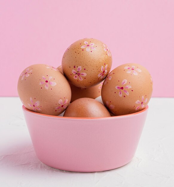 Front view of decorated easter eggs in bowl