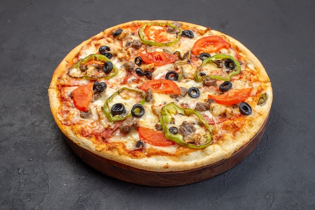 Front view delicious cheese pizza consists of olives pepper and tomatoes on dark surface