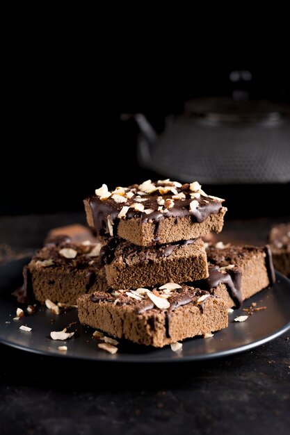 Front view of delicious chocolate cake with almonds