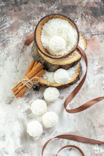 Free photo front view delicious coconut candies on light background goodie color sweet cake holiday red love valentines day couple gift