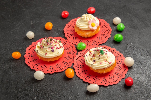 Front view delicious cream cakes dessert for tea on grey background cake cream biscuit sweet cookie dessert