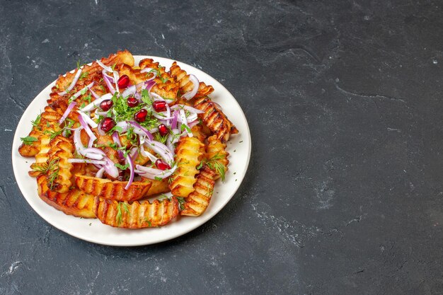 Front view delicious fried potatoes sliced onions on dark background fry meal dish food chicken cooking photo meat