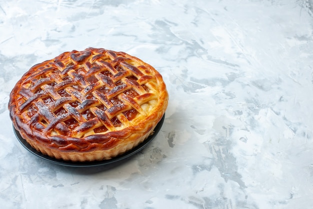 Front view delicious fruity pie with jelly on light background biscuit cookie bake nut pie cake dessert color tea free space