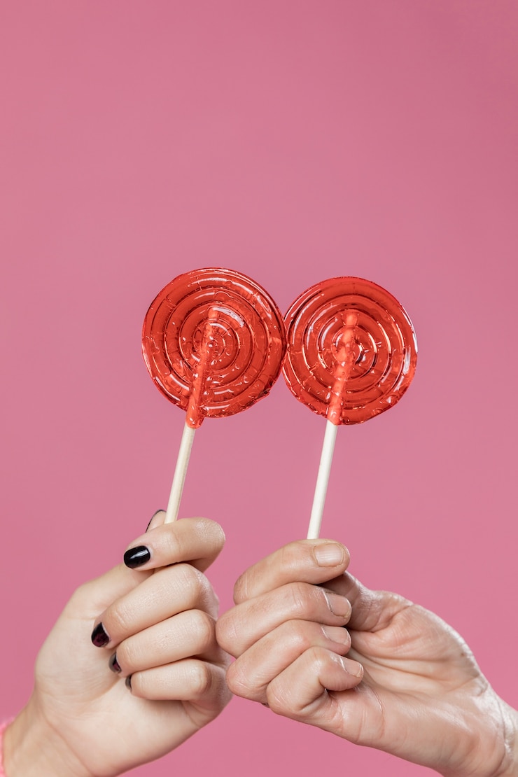 Free Photo front view delicious lollipops