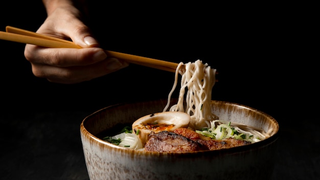 Front view of delicious ramen with copy space