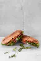 Free photo front view delicious sandwiches composition