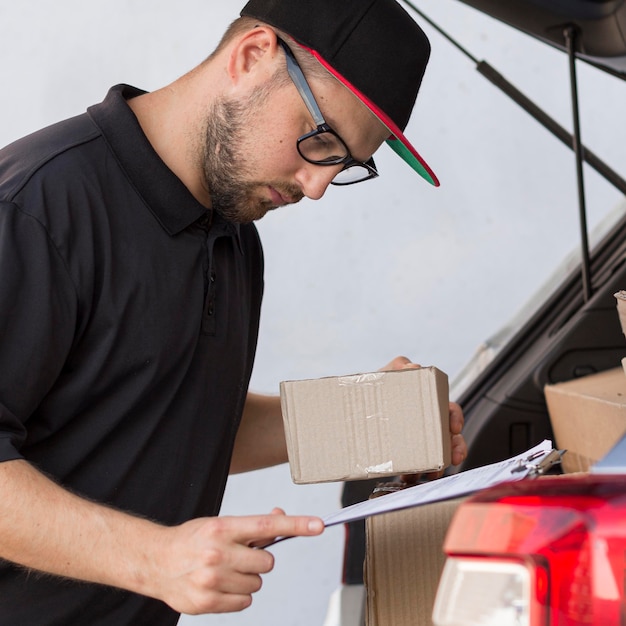 Free photo front view of delivery man concept