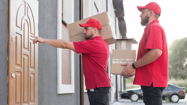 Front view of delivery man with packagaes