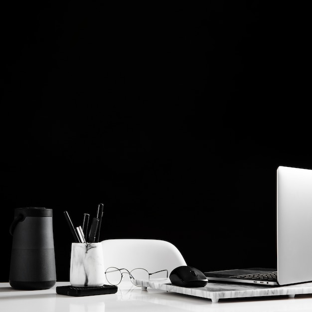 Free photo front view of desk concept with copy space