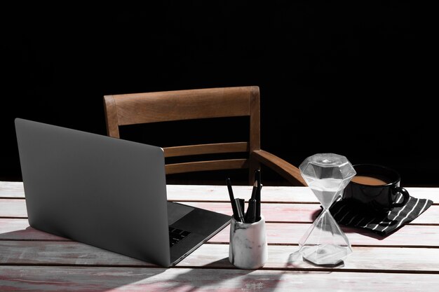 Front view of desk concept on wooden table