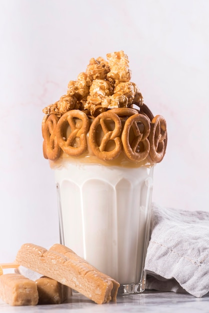 Front view of dessert in glass with pretzels