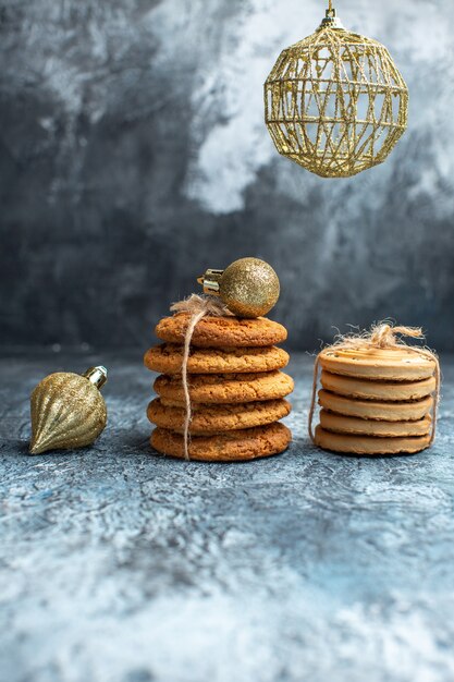 Front view different delicious biscuits on light background