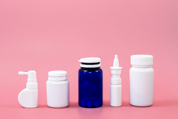 Free photo front view of different pill containers with copy space