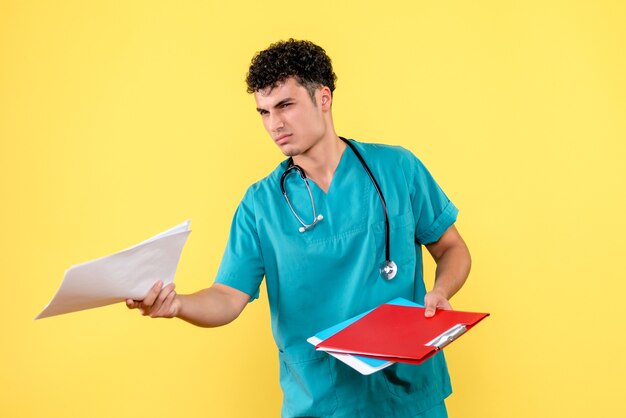 Front view doctor the doctor with folders with documents