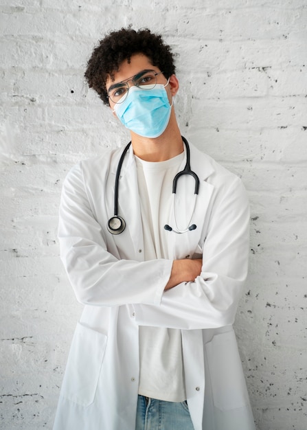 Front view doctor wearing face mask