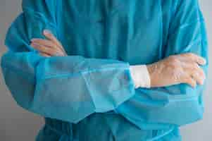 Free photo front view doctor wearing medical gown