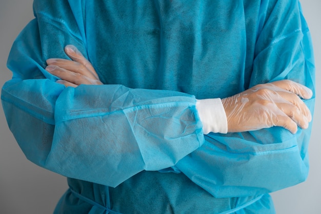 Front view doctor wearing medical gown