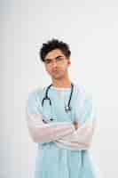 Free photo front view doctor wearing medical gown