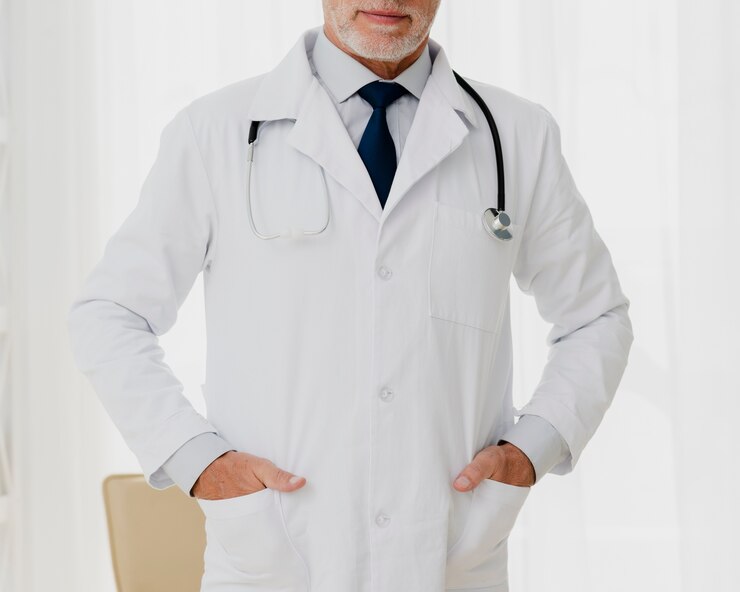 Free Photo front view of doctor with hands in pocket