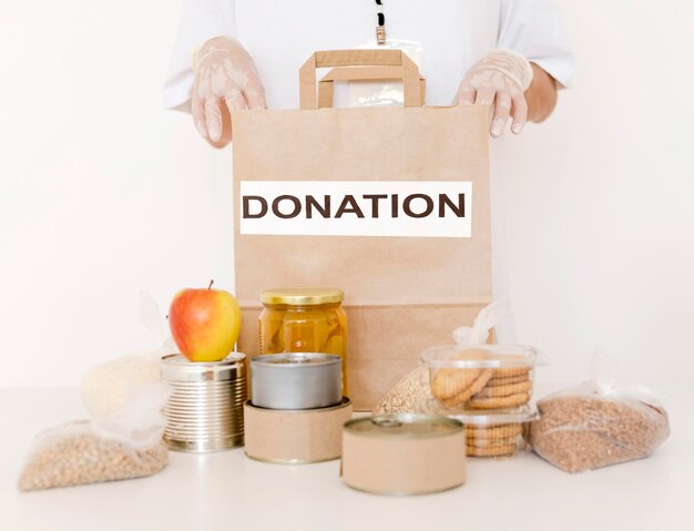 Free photo front view of donation bag with provisions