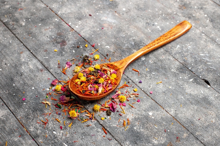 Free Photo front view dried fruity tea fresh with flower flavor on grey rustic space