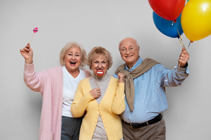 Free Photo front view elder friends partying together