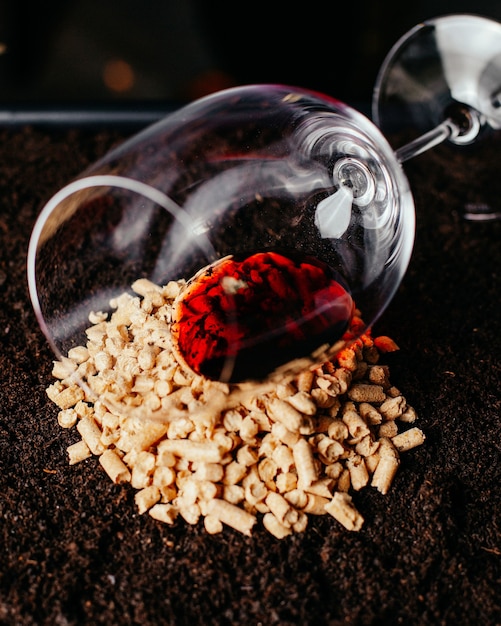 A front view empty glass with red wine on the brown surface drink alcohol photo glass