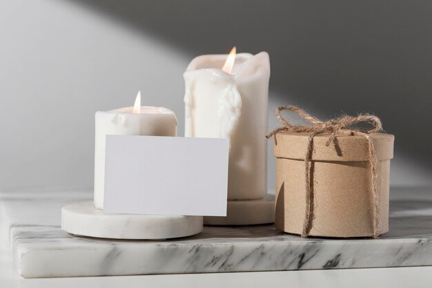 Free photo front view of epiphany day candles and gift box