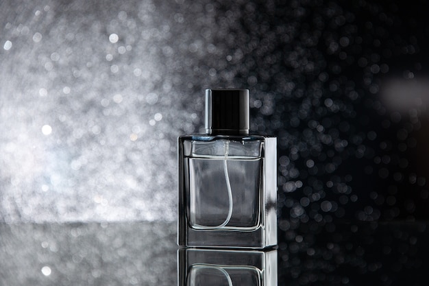Free photo front view expensive perfume as a present on a black table gift scent love fragnance smell valentines day marriage