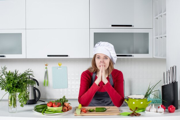 Front view female chef in cook hat and apron