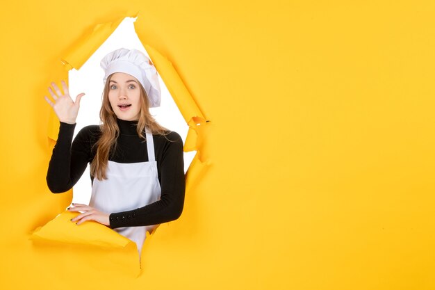 Front view female cook on yellow color sun photo cuisine paper emotion