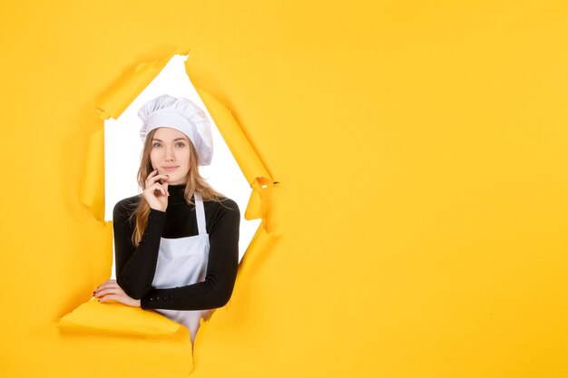 Front view female cook on yellow colors sun photo cuisine job paper emotion food