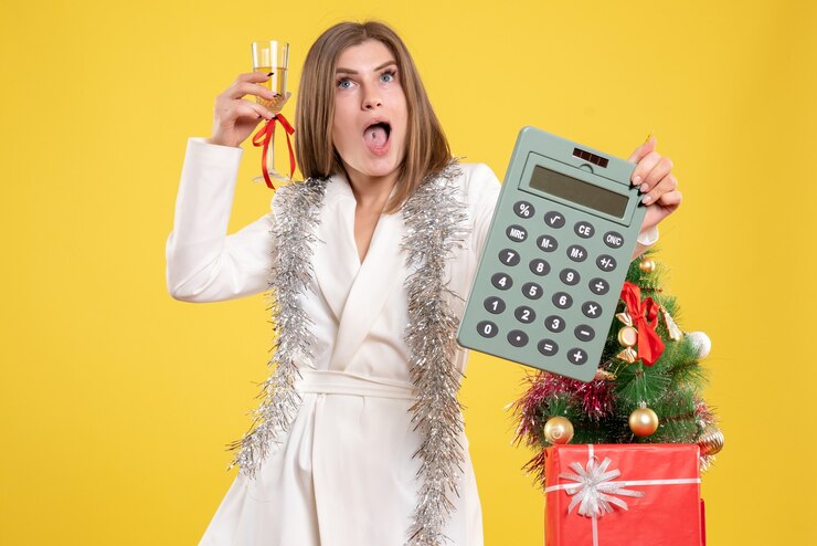 Free Photo front view female doctor holding calculator and champagne