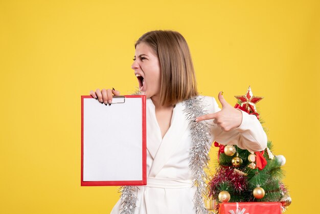 Front view female doctor holding file note