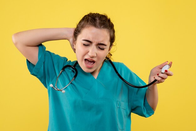 Front view female doctor in medical shirt, color emotion virus covid-19 uniform