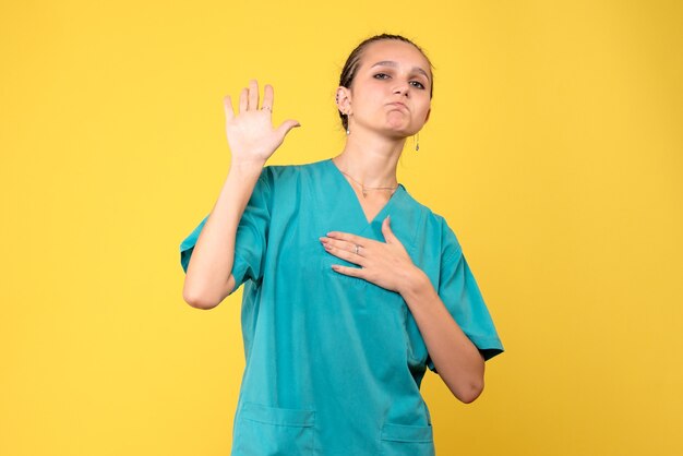 Front view female doctor in medical shirt, health emotion covid-19 virus color nurse hospital