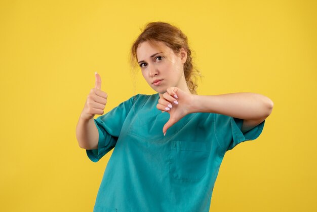 Front view female doctor in medical shirt, health medic covid-19 hospital nurse